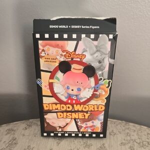 Disney Dimoo World Series Figure with Pink and Red Accents